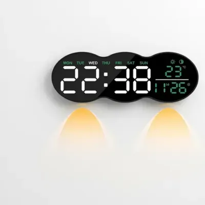 ساعة حائط رقمية ذكية بتصميم ثلاثي الدوائر وإضاءة سفلية دافئة