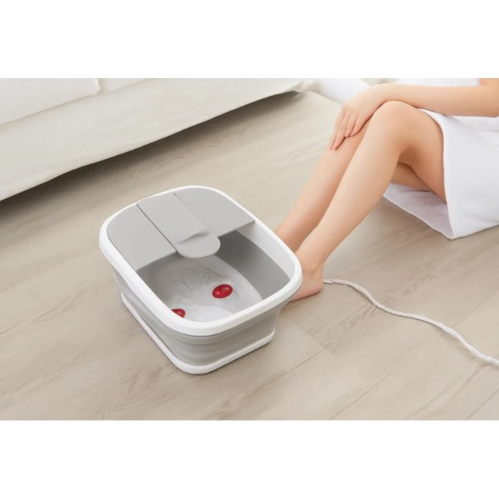 جهاز تدليك للقدمين و دلو ماء سبا لتخفيف آلام إجهاد العضلات
