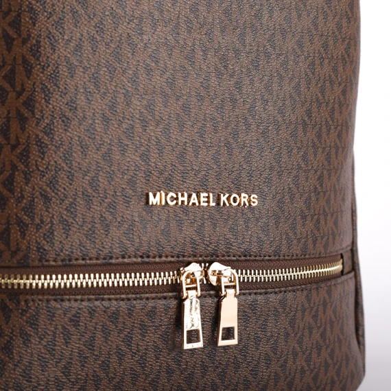 حقيبة  ظهر مصنعة من أجود خامات الجلد - بيد علوية واحزمة كتف وسوستة امامية  - من مايكل كورس للنساء - بني