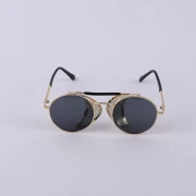 نظارة شمسية دائرية للجنسين من راي بان -  بعدسات سوداء واطار ذهبي - أسود