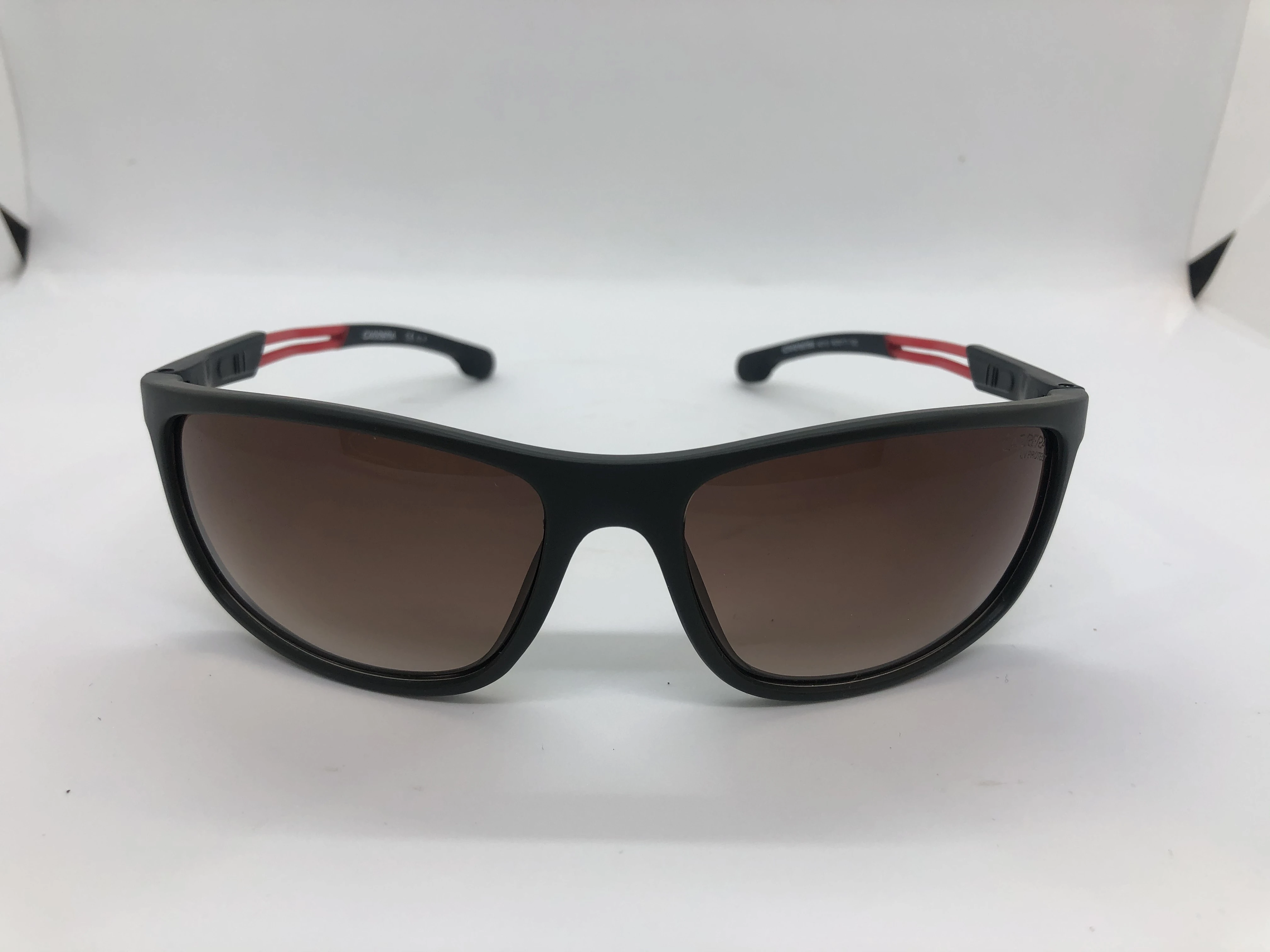 Sunglasses - black from Carrera - with black polycarbonate frame - and hazel lenses - and red * black arms - for men