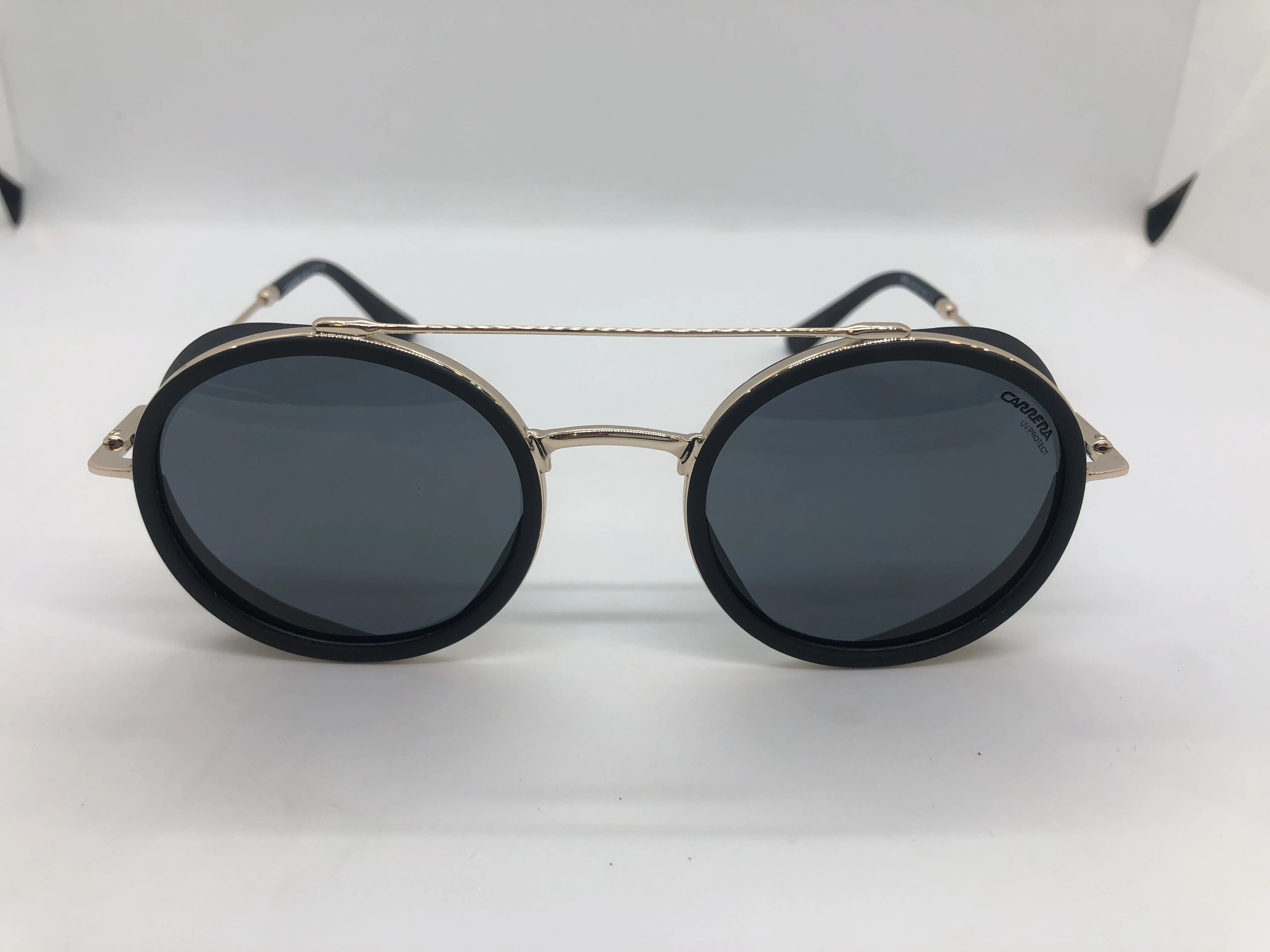 Sunglasses - black from Carrera - with a gold metal frame - and black lenses - for men