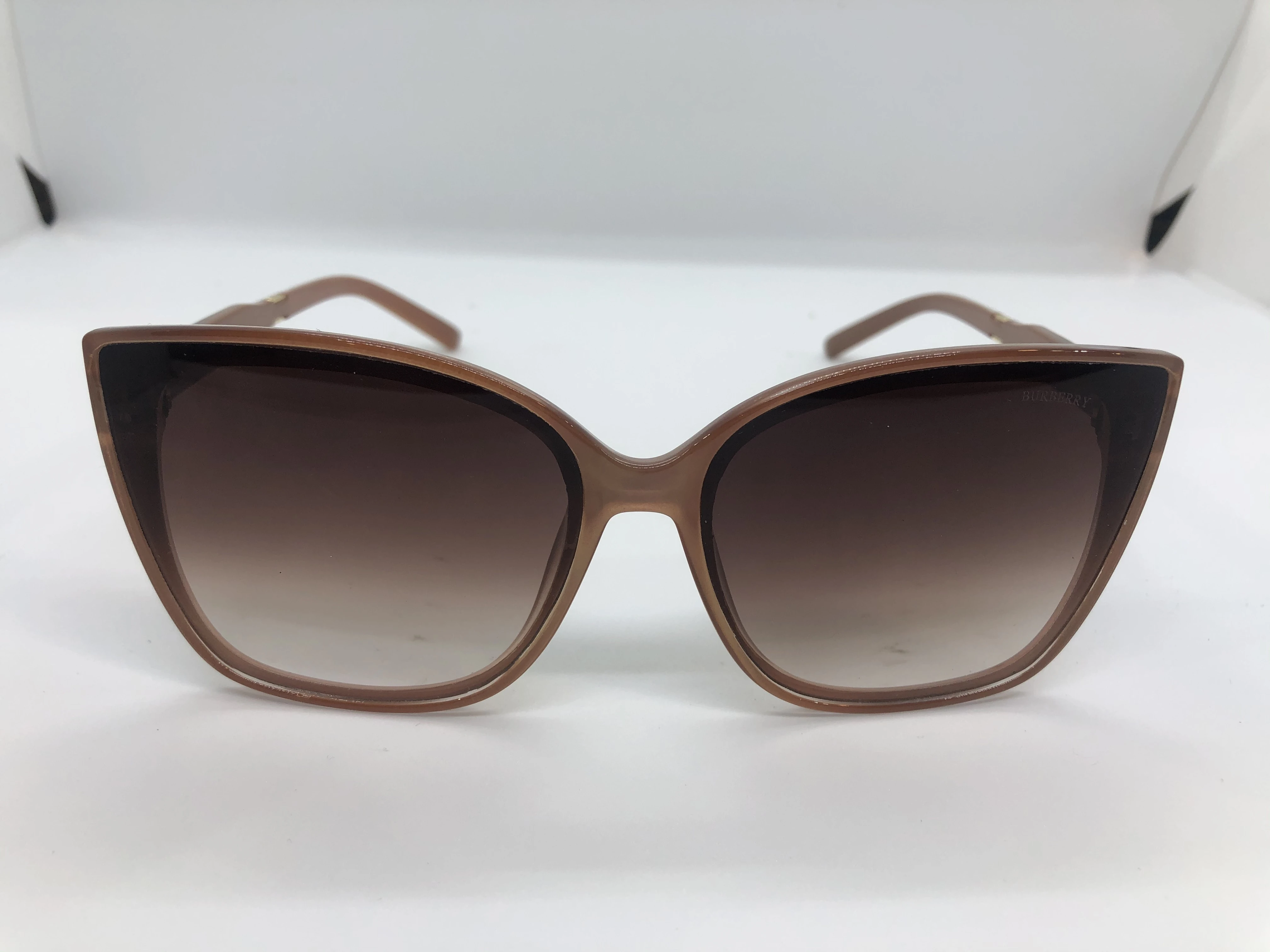 Sunglasses - from Burberry - with light brown polycarbonate frames - light brown gradient lenses - and light brown polycarbonate arms - with the brand logo - Womens