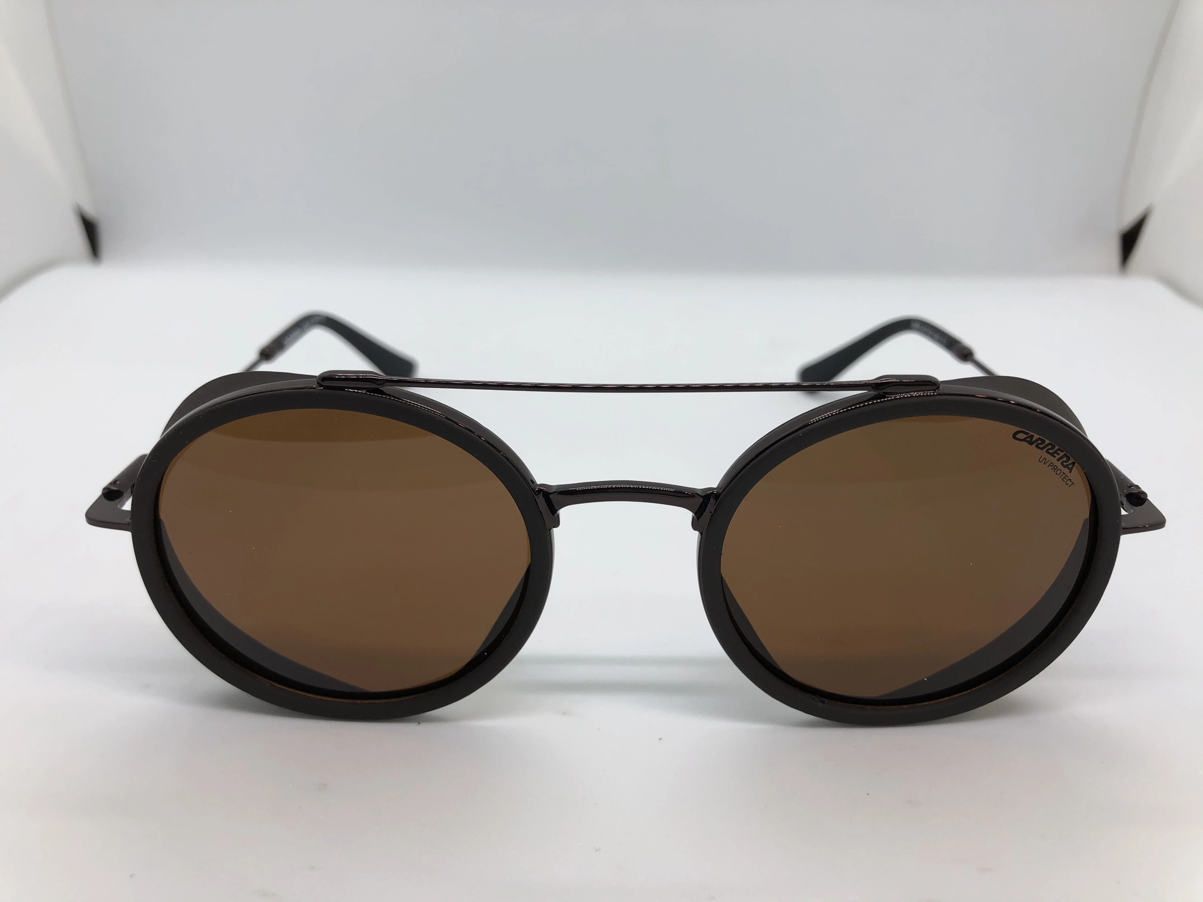 Sunglasses - from Carrera - with a dark brown frame of metal and polycarbonate - dark brown lenses - and dark brown metal arms - for men