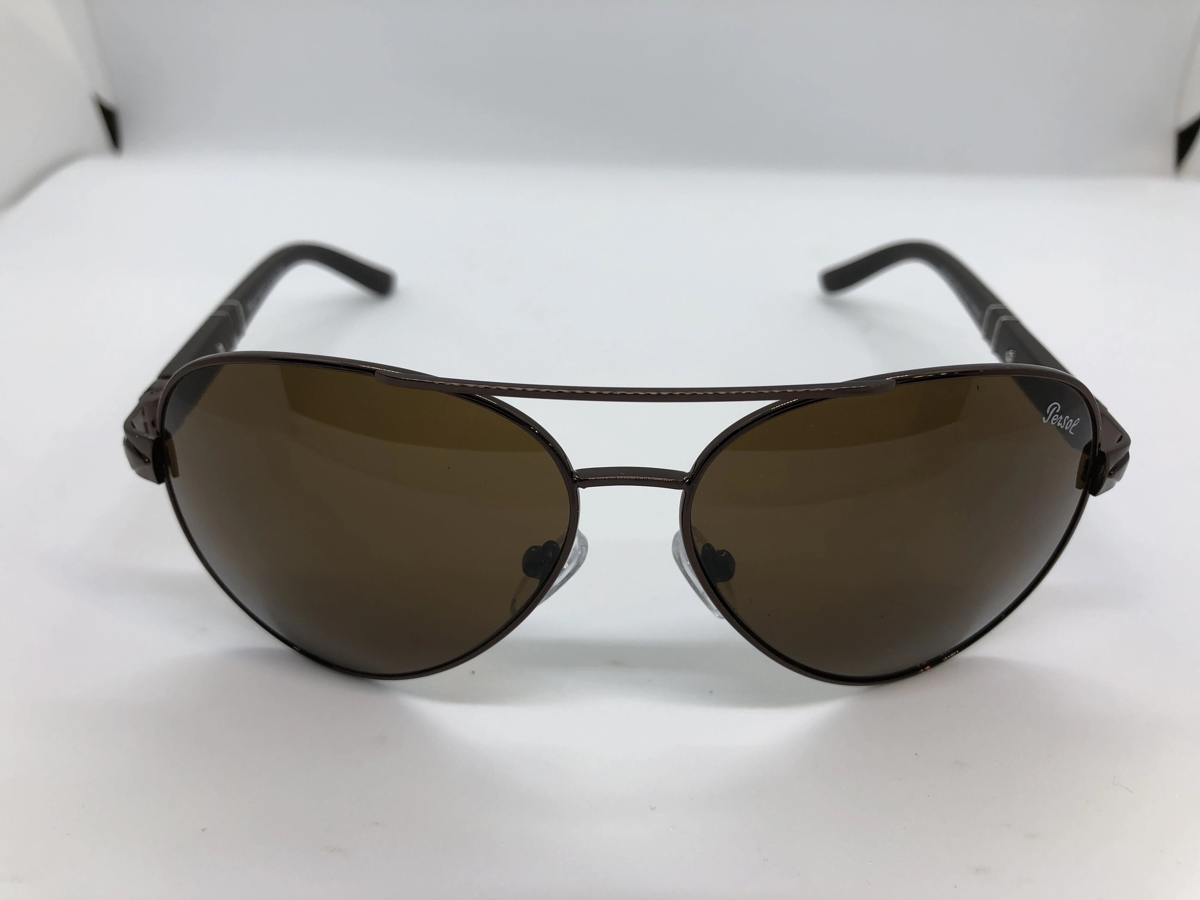 Sunglasses - from Persol - with dark brown metal frame - and dark brown lenses - and dark brown polycarbonate arm - for men