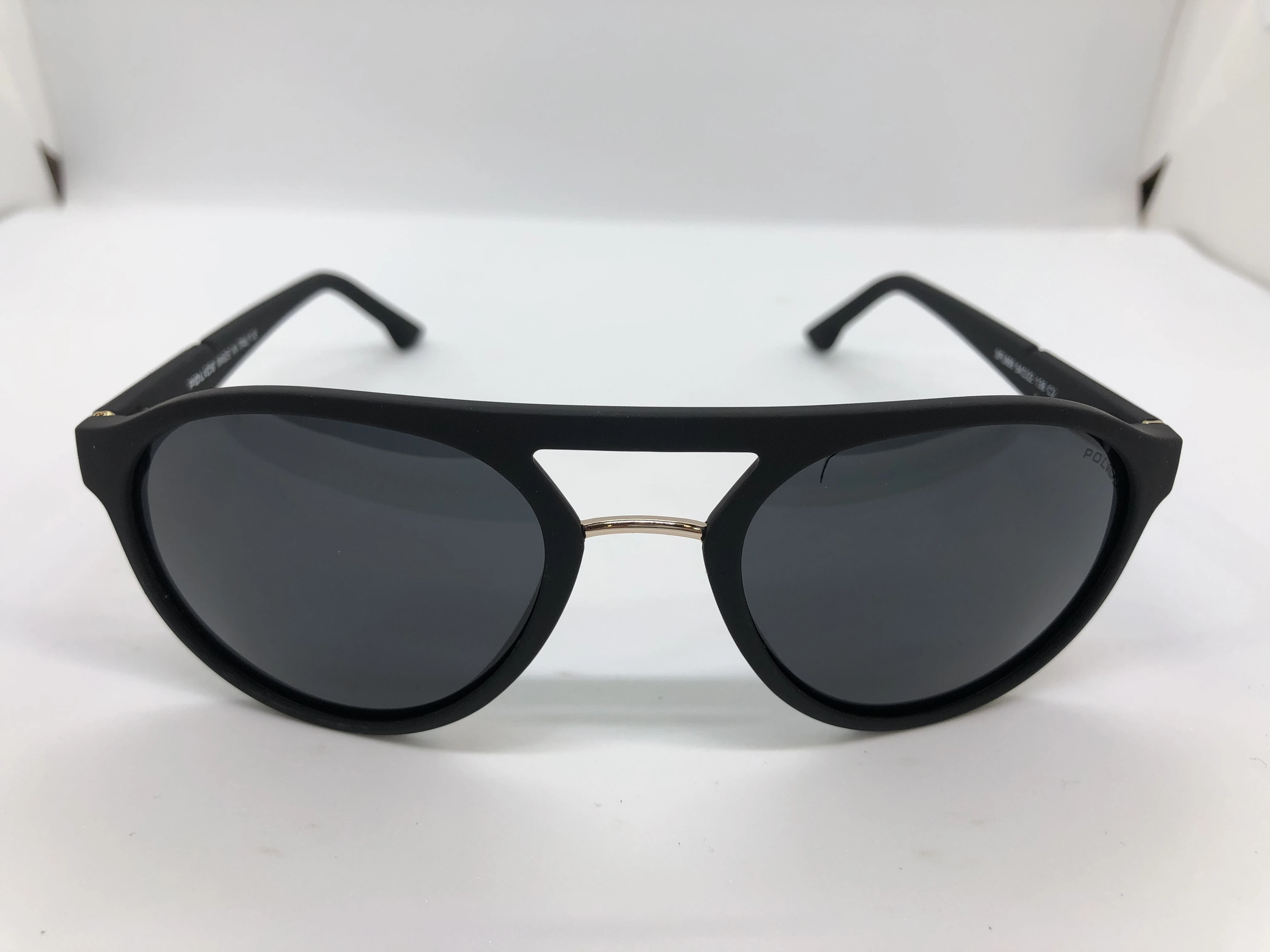 Sunglasses - from POLICE - black polycarbonate frame - black lenses - black polycarbonate arm - golden logo - men