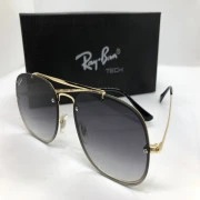 نظارة شمسية - من راي بان - باطار معدن ذهبي - وعدسات ملونة متدرجة - وزراع ذهبي معدن - رجالي