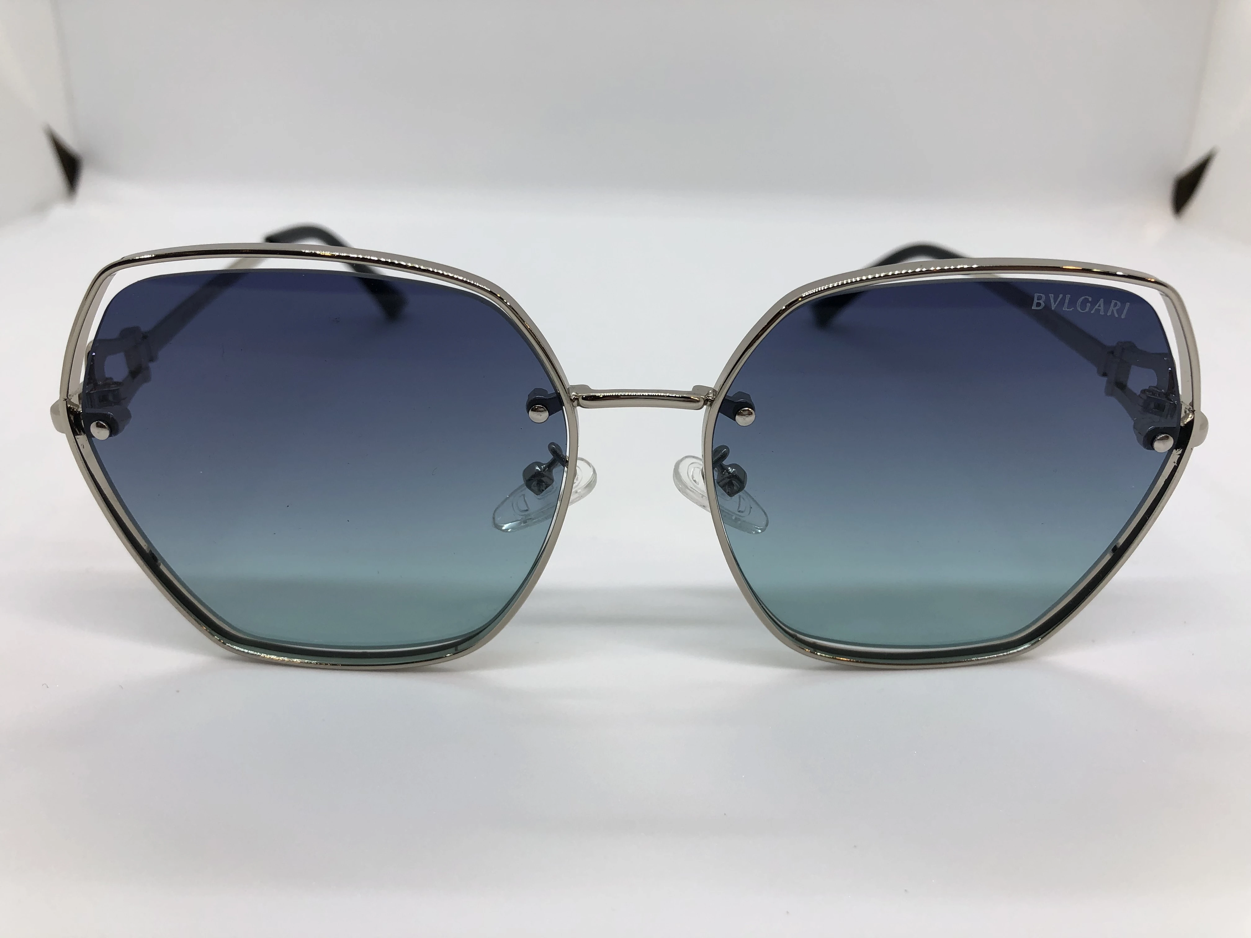 Sunglasses - from Bvlgari - silver metal frame - gradient colored lenses - silver metal arm - silver brand logo - for women