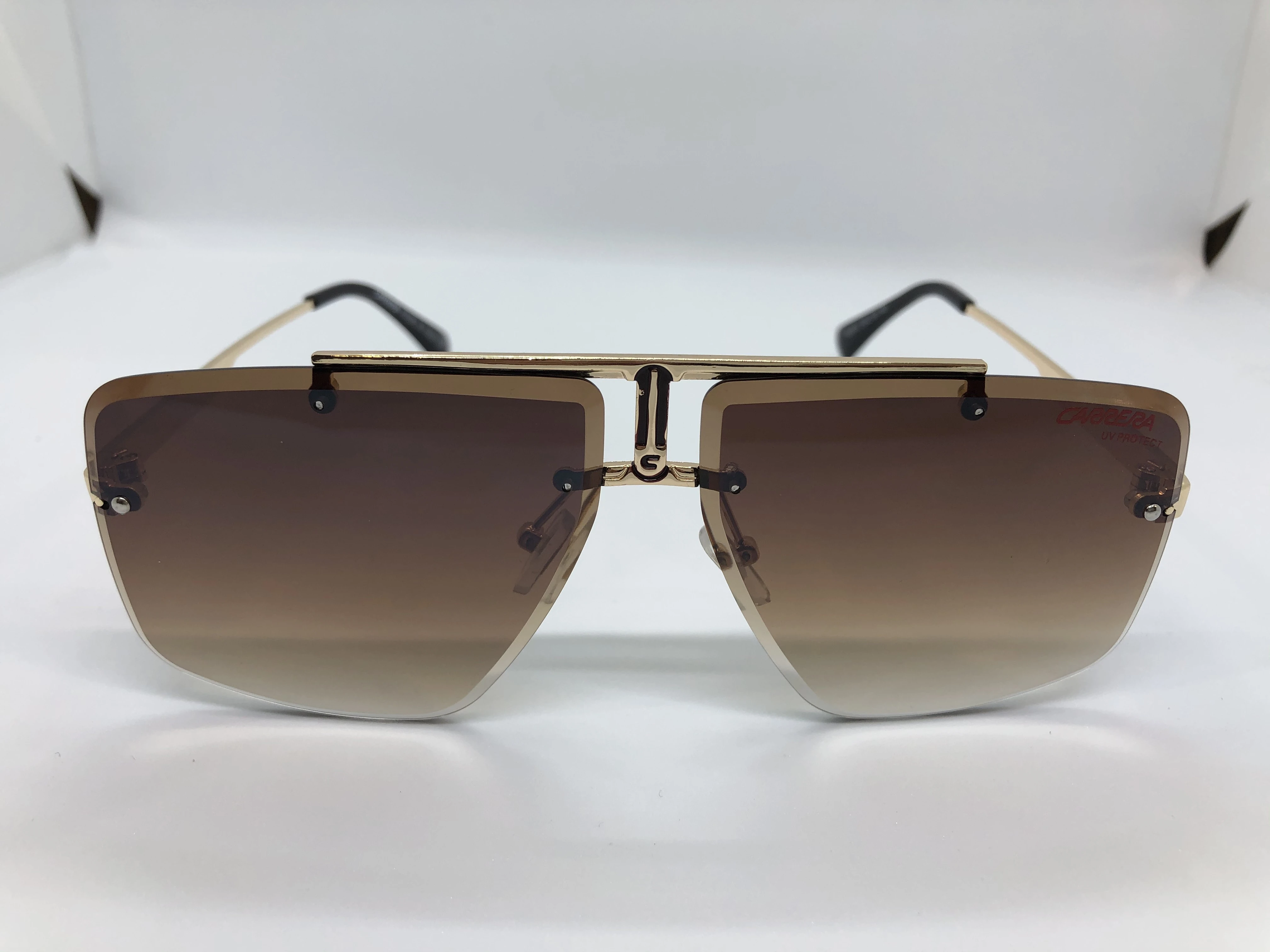 Sunglasses - from Carrera - without frame - light brown gradient lenses - golden metal arm - with engraved lenses
