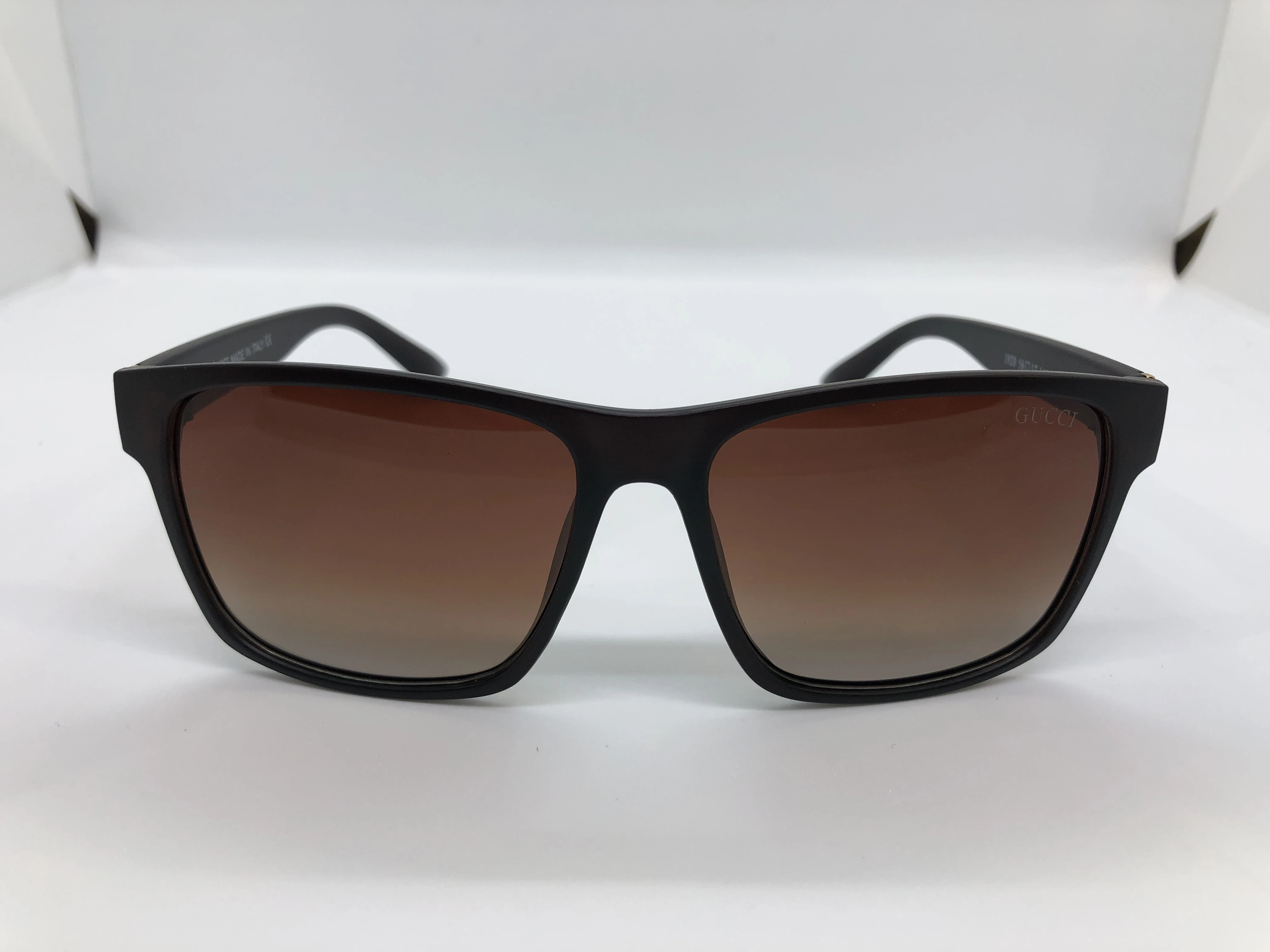Gucci sunglasses - dark brown polycarbonate frame - dark brown gradient lenses - dark brown polycarbonate sunglasses - golden logo - men