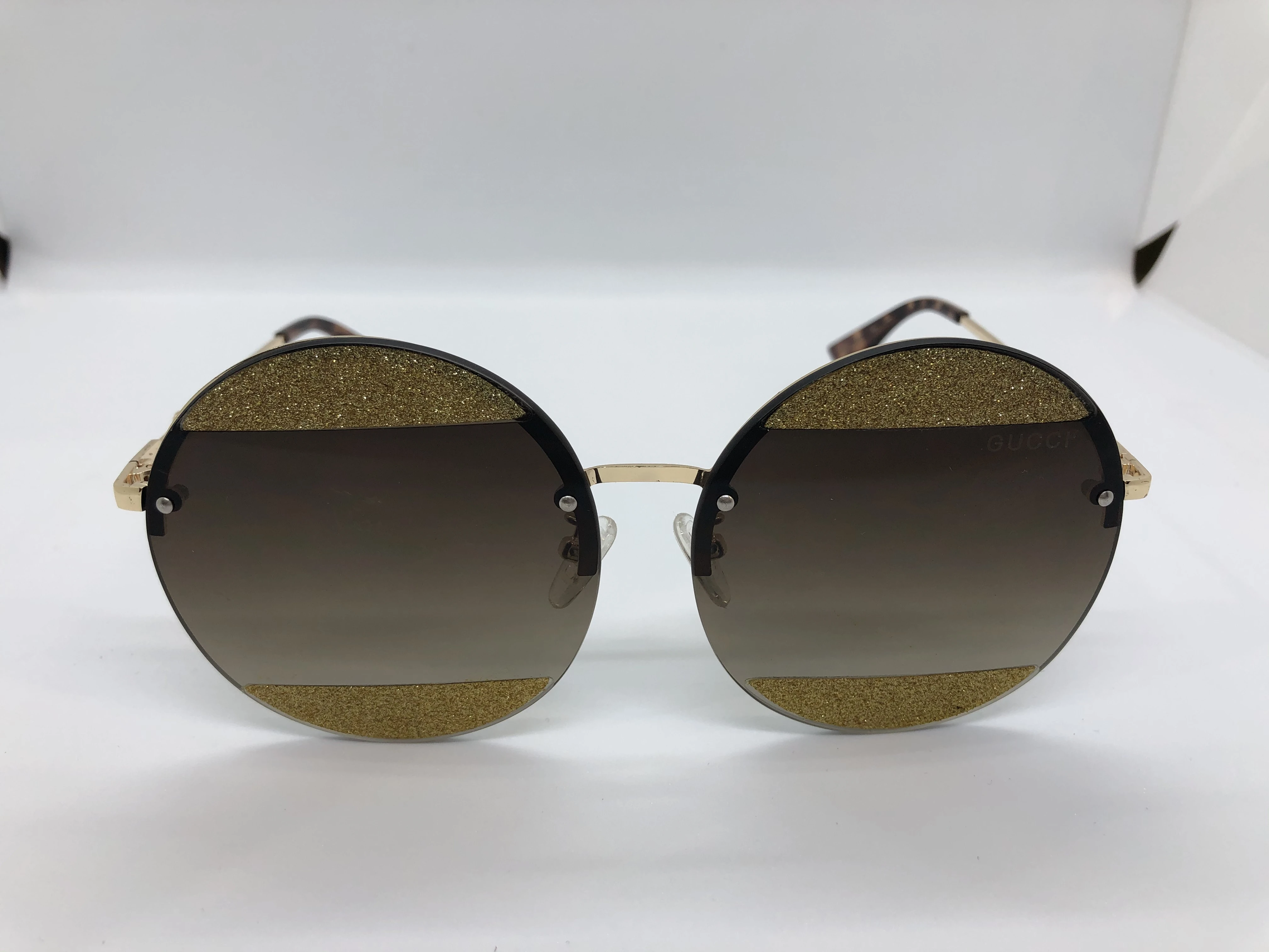 Gucci sunglasses - golden metal frame - golden bronze glossy transparent gradient lenses - golden metal arm - golden logo - for women