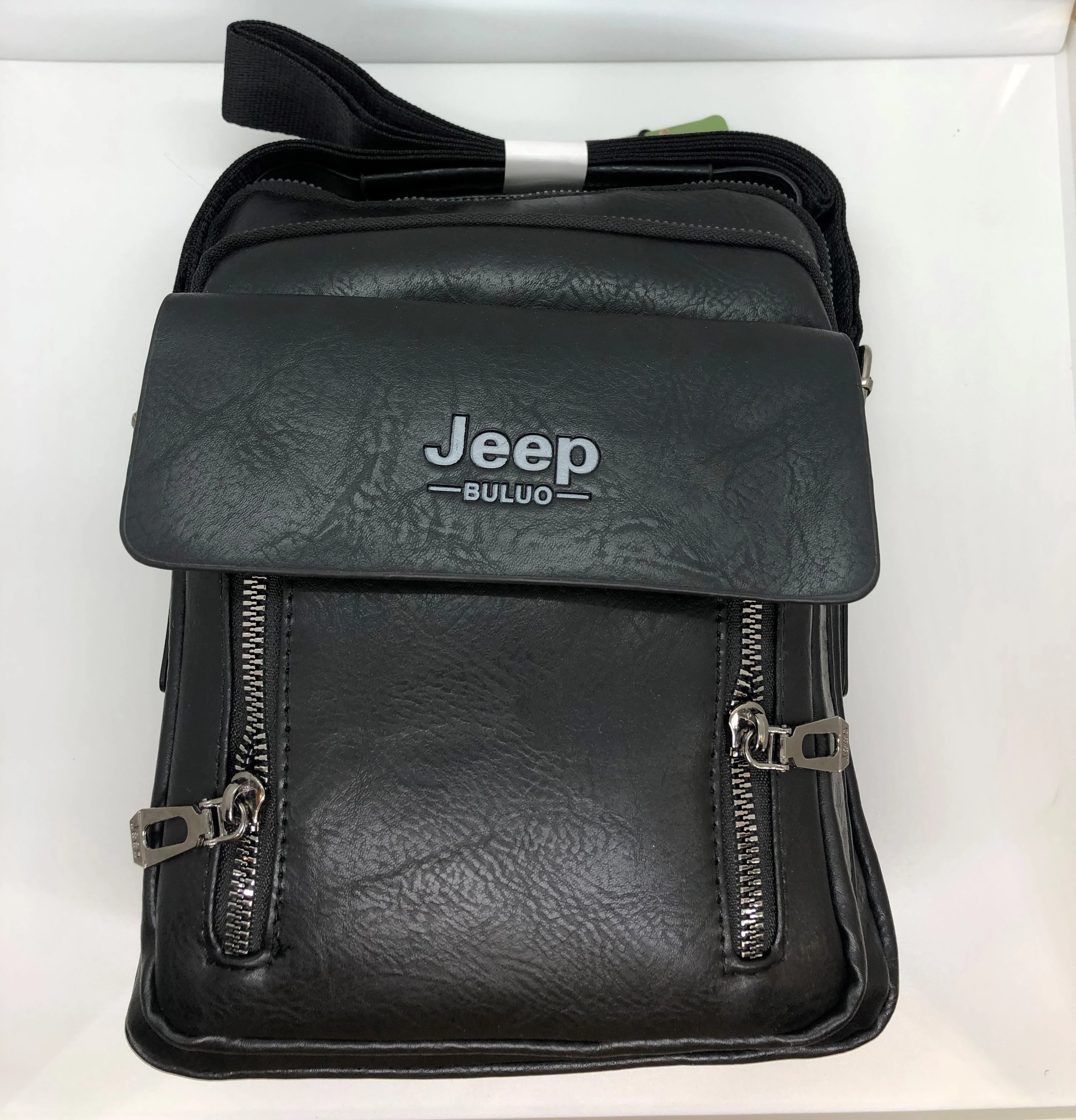 Leather bags from Jeep Cross shoulder strap in hand, black color