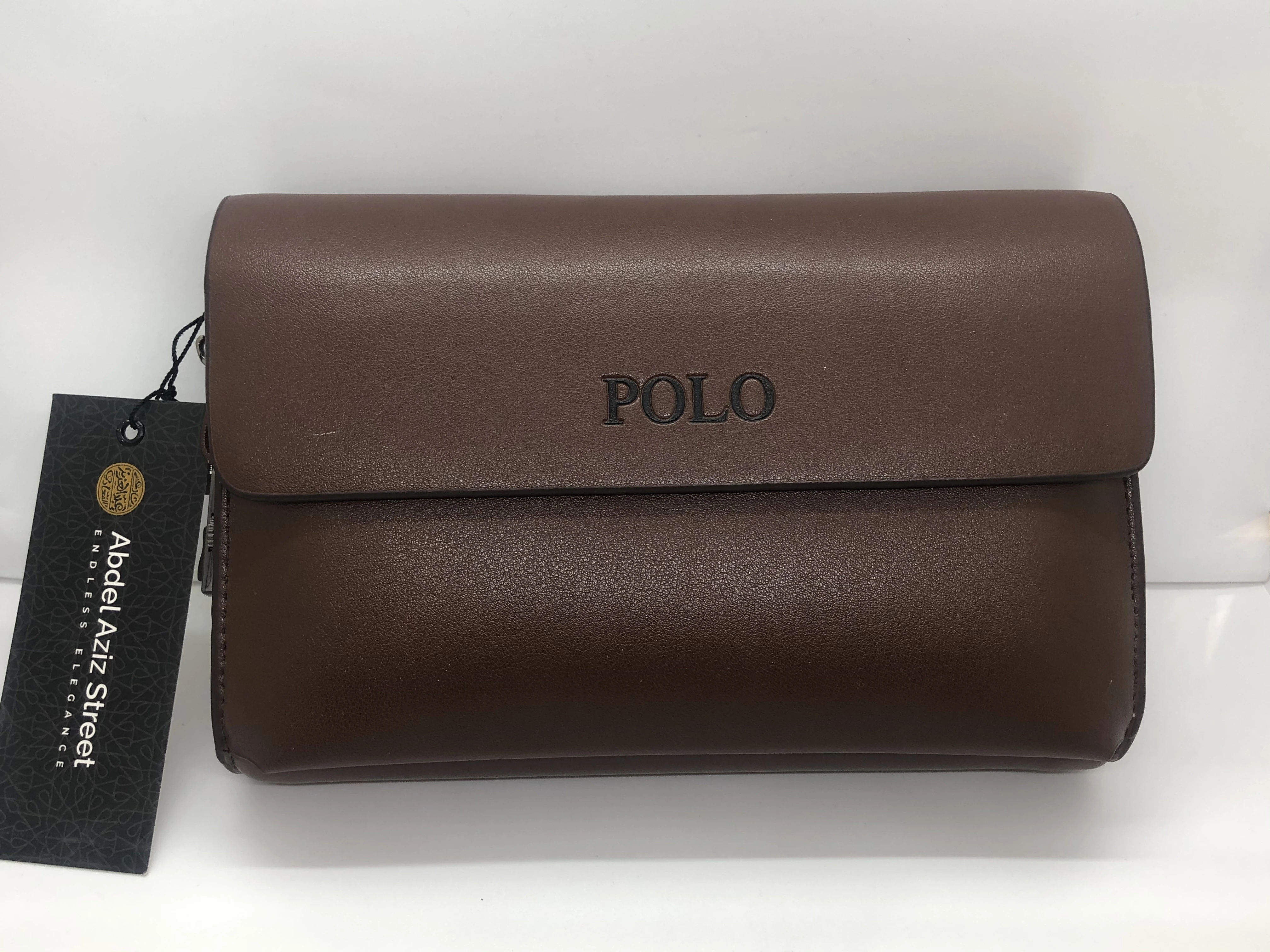 Leather polo handbags in dark brown color