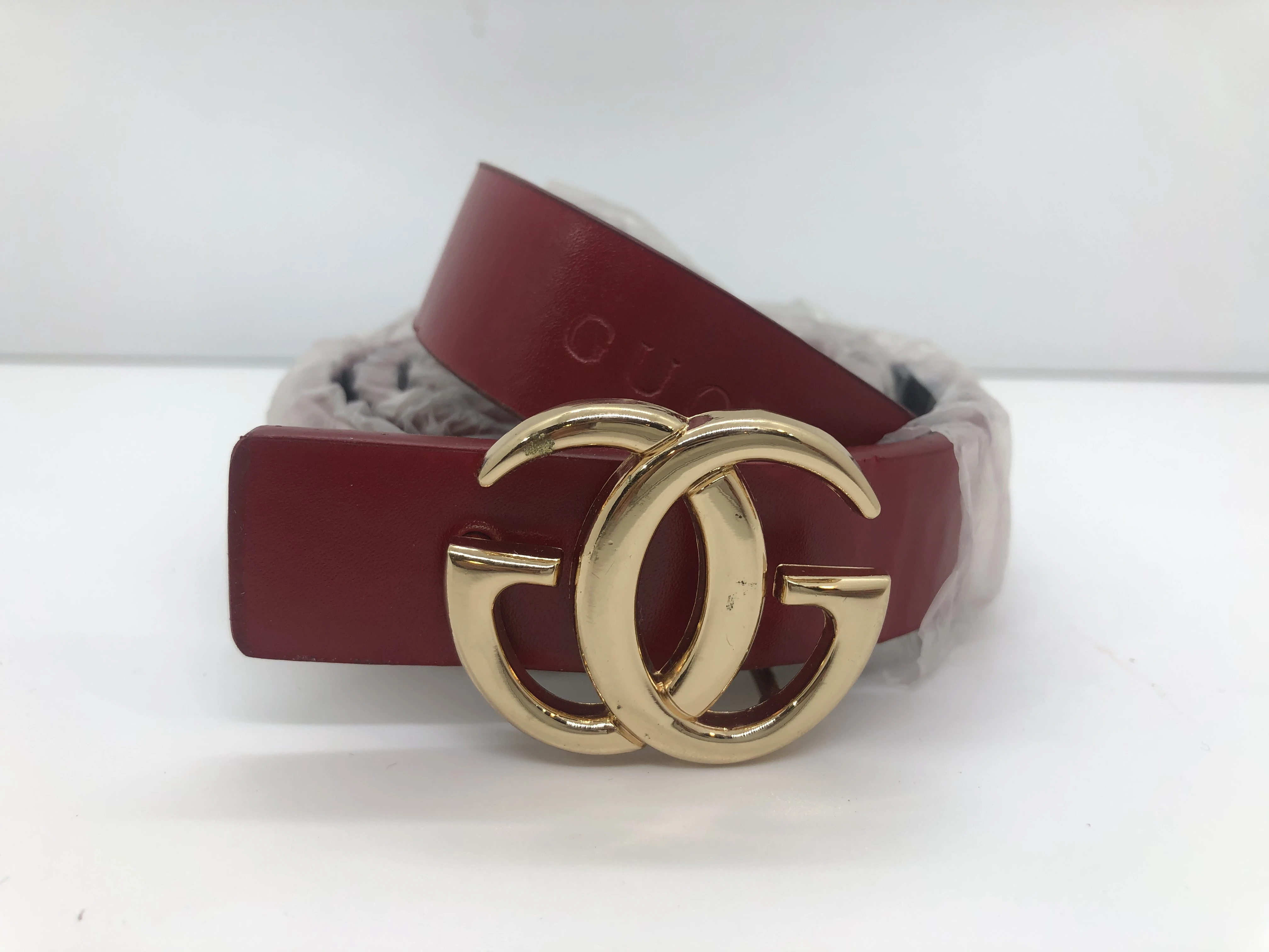 Gucci women's belt, maroon, golden buckle, finished with the brand's logo