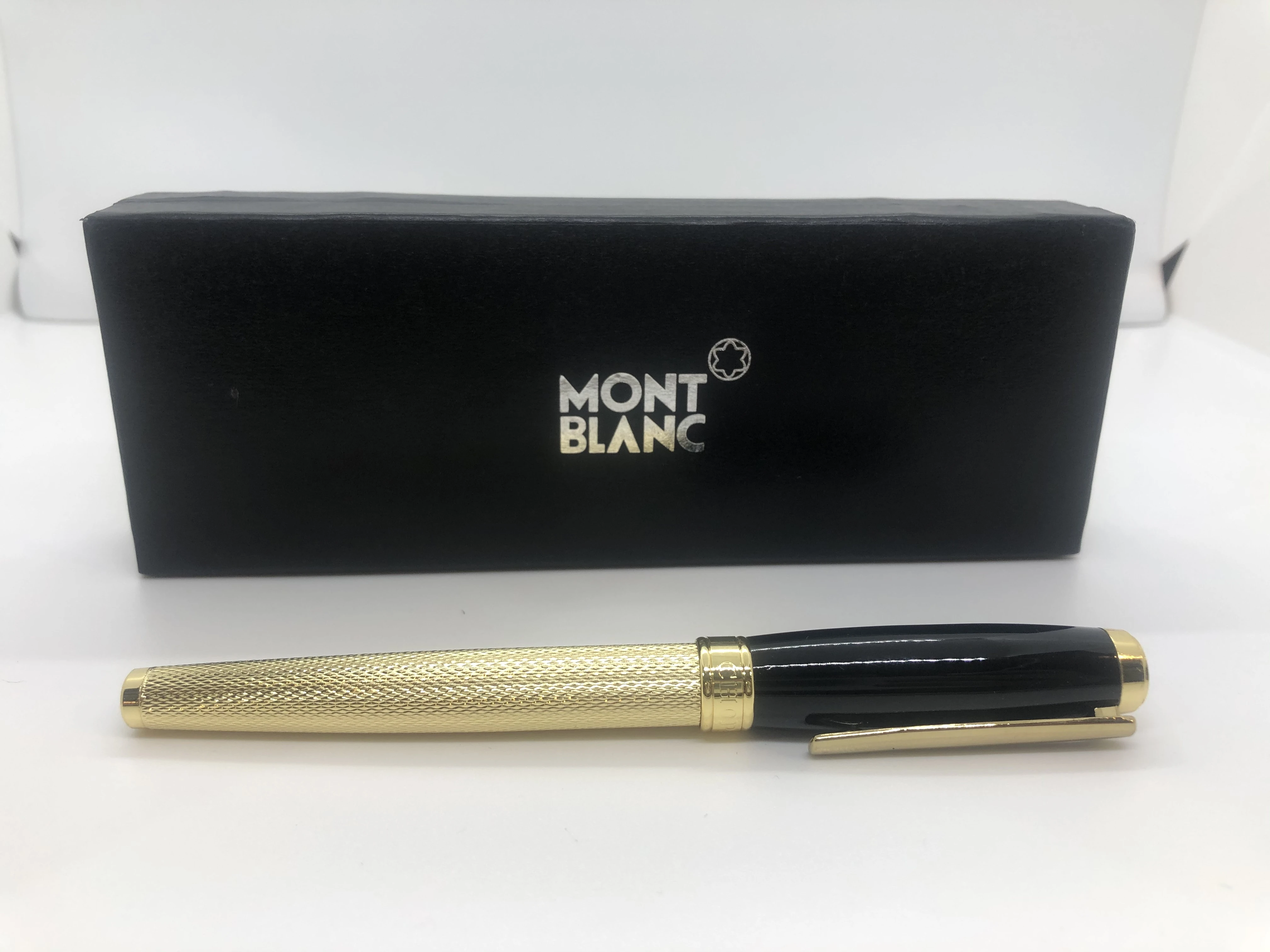Pen from Chopard, black * gold - with engraved touches - with the brand's logo in rotation