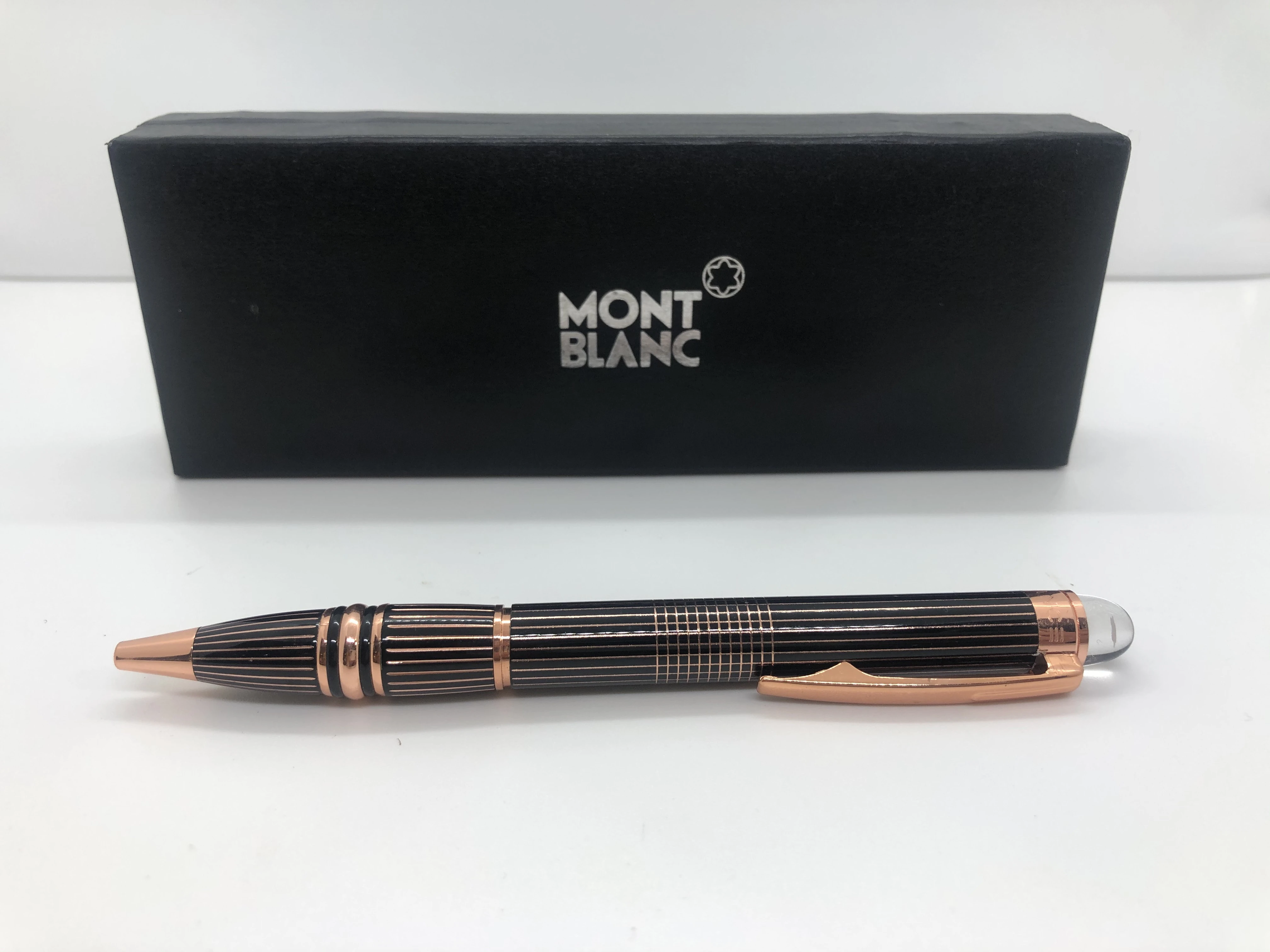 Mont Blanc pen black * rose gold - with engraved touches - with the star brand logo on the top engraved in the rotation