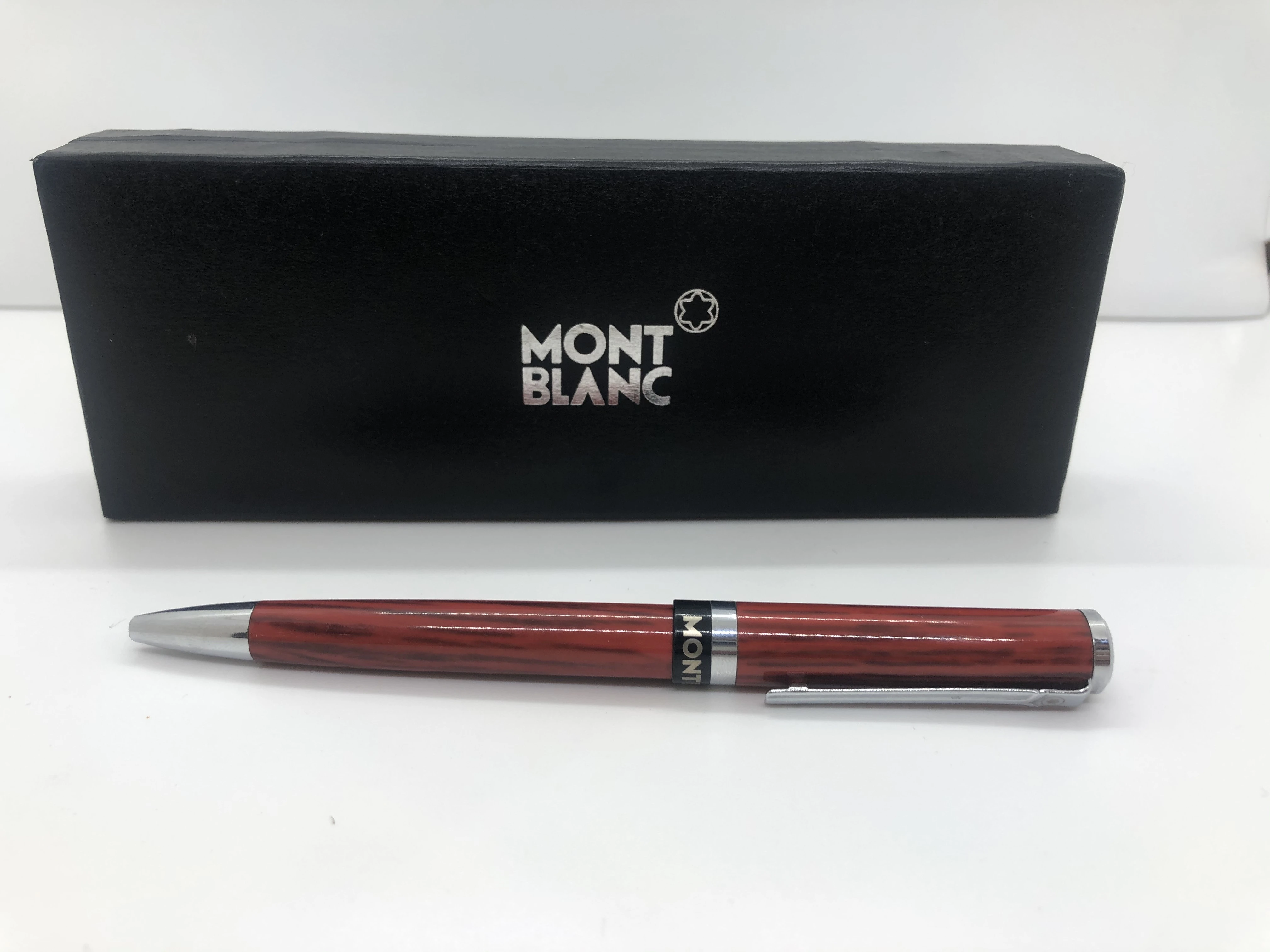 Mont Blanc pen, Burgundy * silver - with engraved touches - with the star brand logo on the top engraved in the rotation