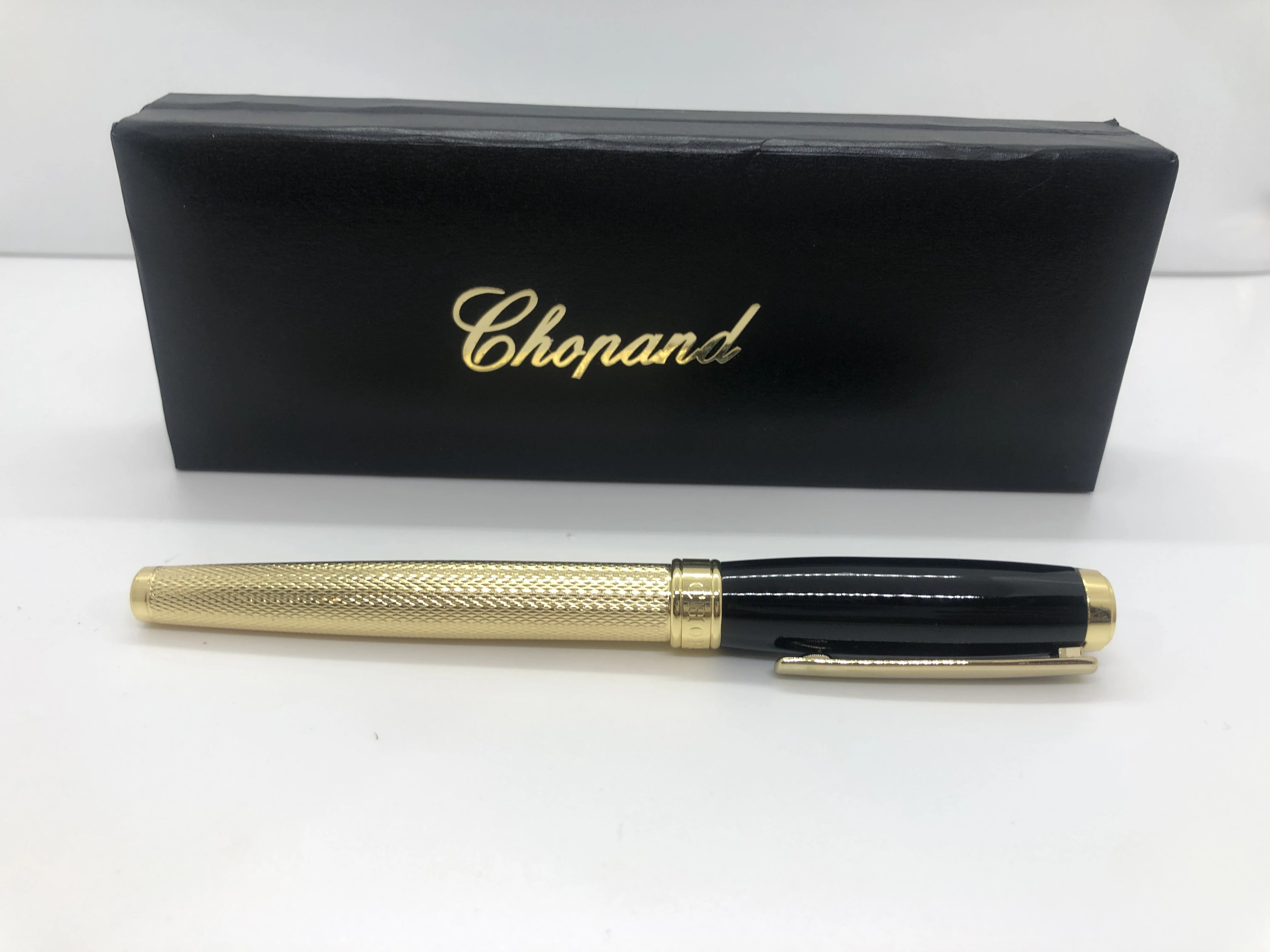 Chopard pen gold * black - with embossed touches - with the brand's logo on top and engraved in the rotation