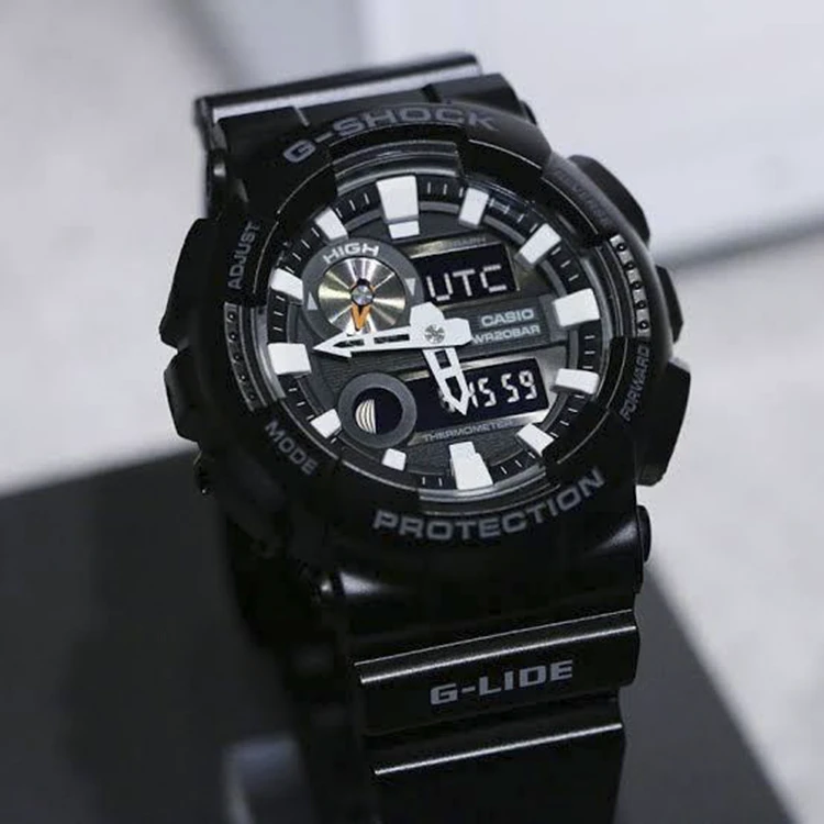 ساعة كاسيو الرجالية G-Shock XL Series اليابانية كوارتز بحزام من الراتنج ، أسود ، 29.4 (موديل: GAX100B-1A)