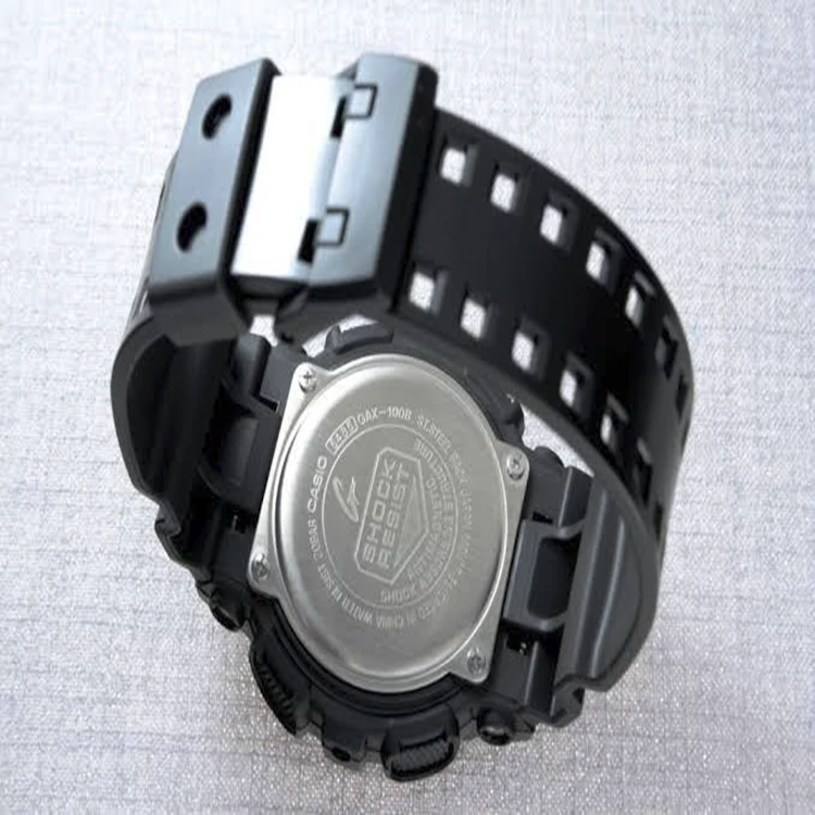 ساعة كاسيو الرجالية G-Shock XL Series اليابانية كوارتز بحزام من الراتنج ، أسود ، 29.4 (موديل: GAX100B-1A)
